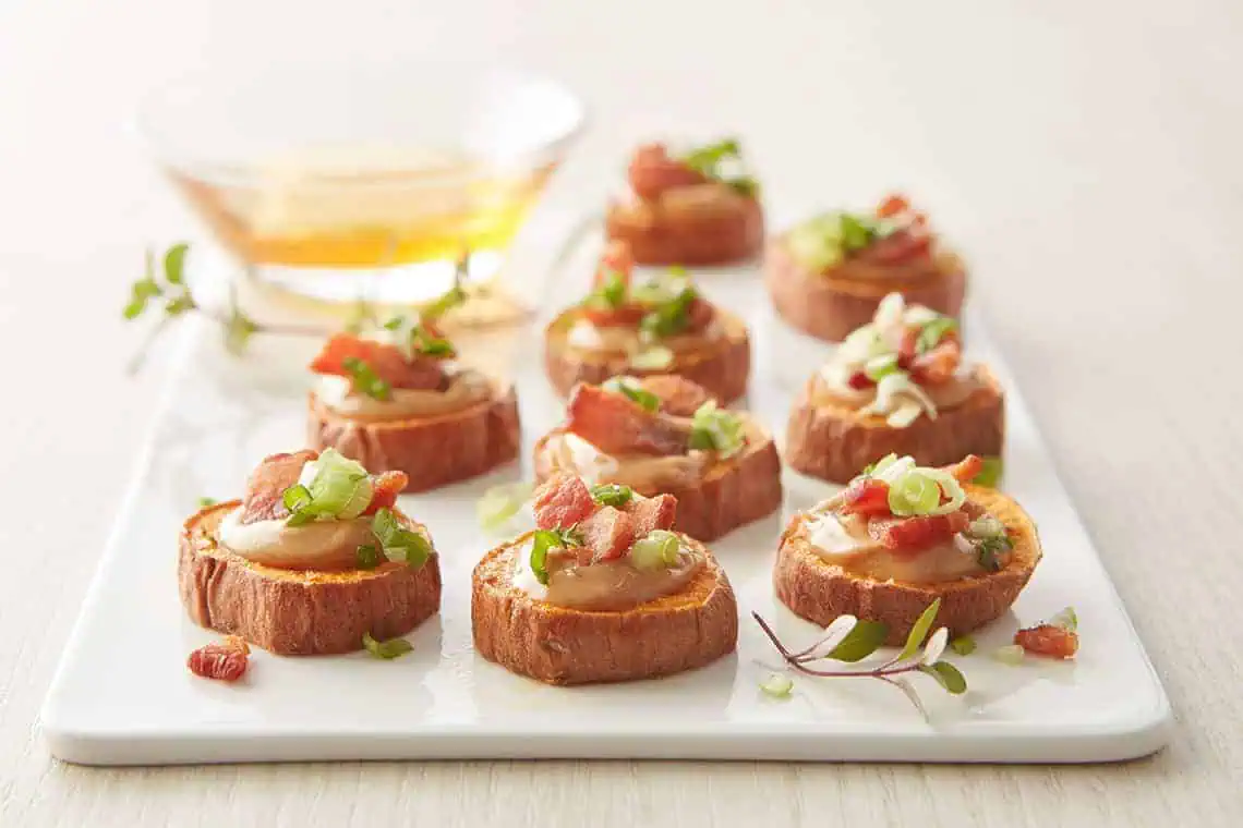 Recipe for Peanut butter-Bacon Sweet Potato Bites made with mini sweet potatoes