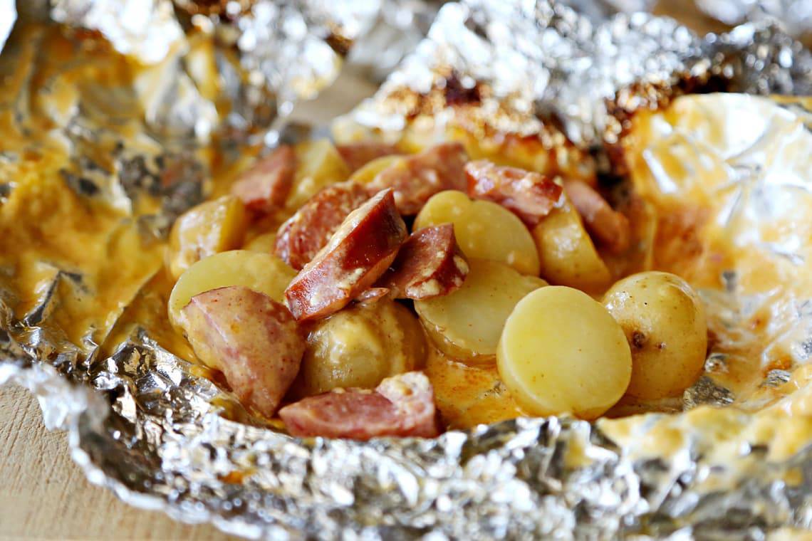 Recipe for Cheesy Potato and Sausage Foil Packets made with baby potatoes