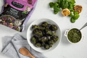 Tasteful Selections recipe for Steamed Purple Passion with Roasted Garlic Pesto made with small potatoes