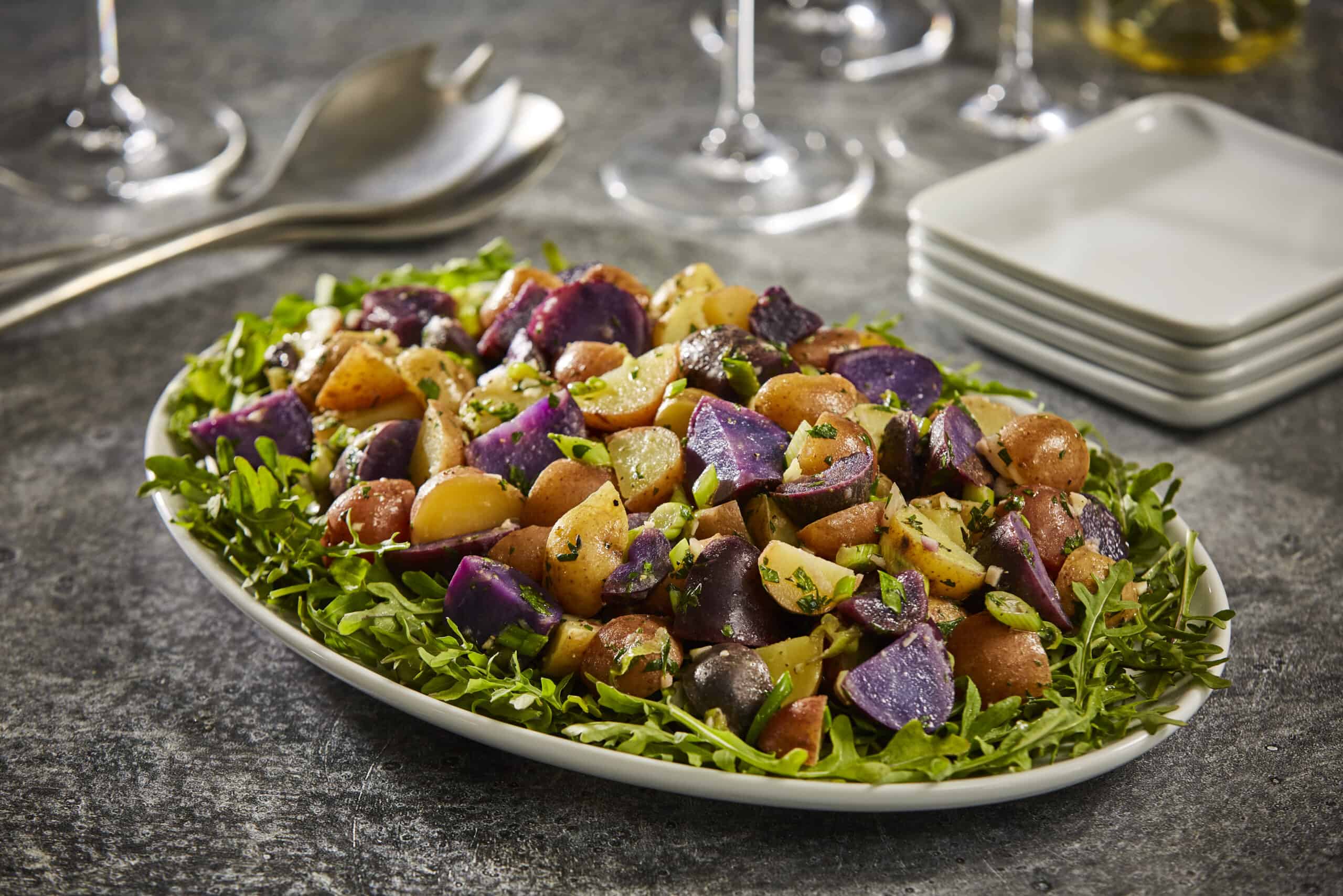 Tasteful Selections Potatoes over a bed of arugula.