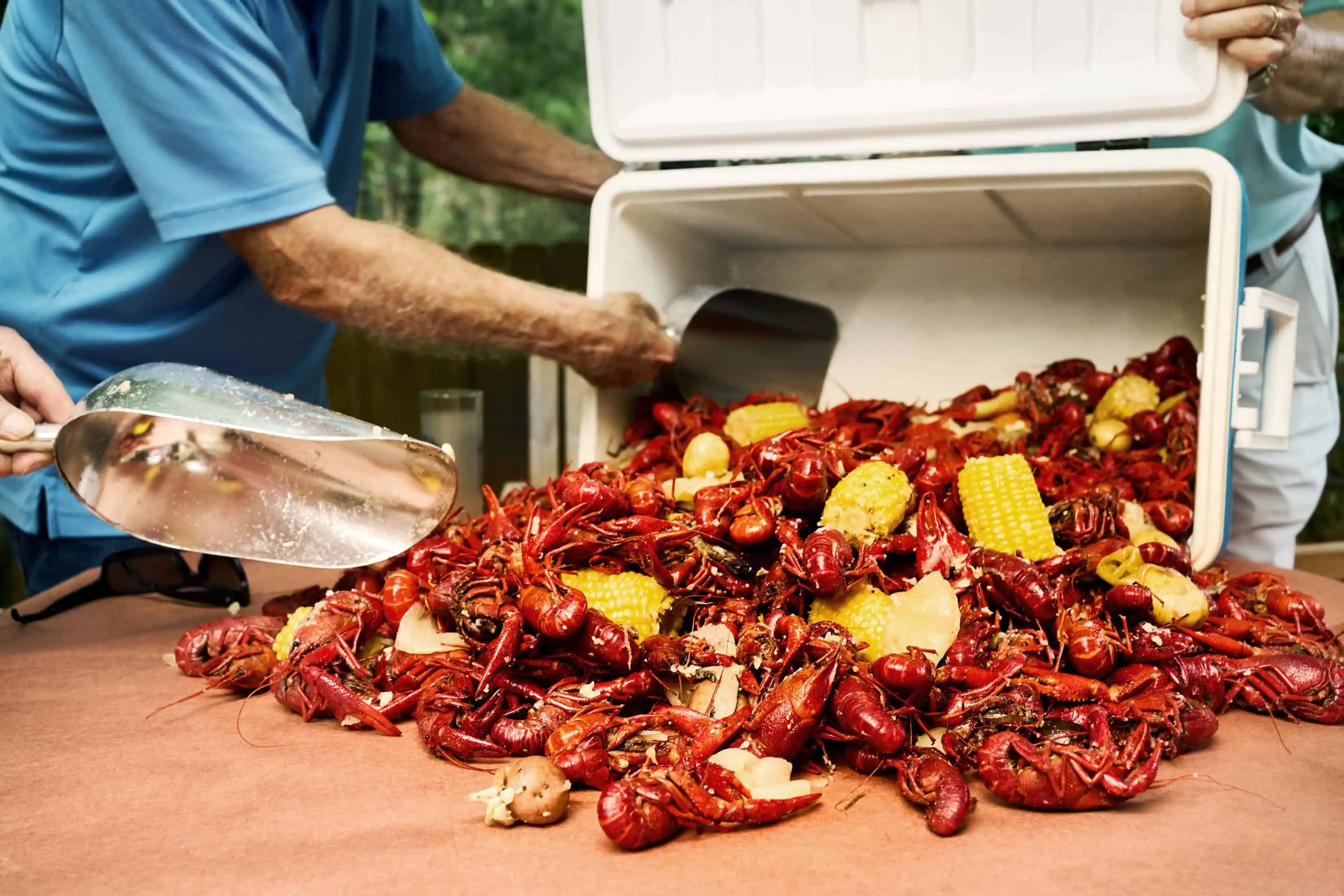 Men making seafood boil
